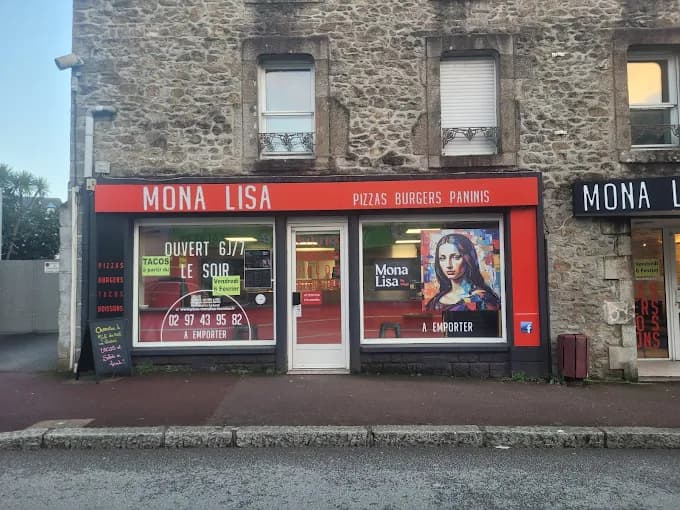 Façade du restaurant Pizza Mona Lisa en soirée